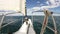 Sailing in the wind through the waves. Sailing boat shot in HD at the Baikal lake.