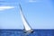 Sailing in the wind through the waves. Sailing boats at the Mediteranean sea. Nature.