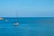 Sailing yacht in the blue sea. Ship yacht sails in the open Sea. Luxury boats. Crete, Greece.