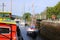 Sailing yacht entering canal lock