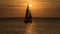 Sailing yacht glides on tranquil seascape at sunset silhouette generated by AI