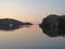 Sailing yacht on the river bank. Dawn on the river.