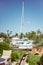 Sailing yachts, motorboats and boats moored to the pier on the yacht club