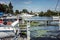 Sailing yachts, motorboats and boats moored to the pier on the yacht club