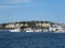 Sailing yachts stand with sails lowered in a small port. Croatia, Istra - July 18, 2010