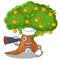 Sailor with binocular cartoon orange tree beside the house