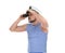 Sailor with looking through monocular on white background