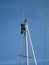 Sailor mounted on the mast of his boat in the port of LÃ©guÃ© side PlÃ©rin