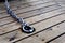 Sailor rope and knot on a wooden pier at the seaside