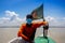 A sailor wears a face mask while navigating a river during a Coronavirus outbreaks at Chandpur,