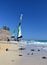 Sailors pulling their sailboat ashore. Playa de Butihondo, Morro Jable, Fuerteventura