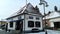 Saint Andre / Hungary - March 04, 2018: one-story house turned into a souvenir shop for tourists. White facade, antique windows