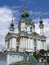 Saint Andrew church on blue sky with white clouds with golden cupola, Kiev, Ukraine