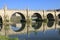 Saint Angel bridge and its reflection in the water Tiber river in Rome,Italy