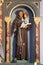 Saint Anthony of Padua holds baby Jesus