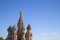 Saint Basilic Cathedral colourful domes on a blue sunny sky