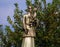 Saint Cajetan Statue with green trees in background in Buenos Aires Argentina