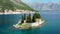 Saint George Island and Church of Our Lady of the Rocks in Perast, Montenegro. Our Lady of the Rock island and Church in Perast on