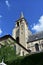 Saint Germain des Pres Abbey, Paris, France. Tower with ivy, sunny day, blue sky.