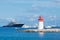 Saint-Jean-Cap-Ferrat, France, September 2021. Beautiful view of the sea, mountains and lighthouse. Azure Coast.