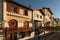 SAINT JEAN DE LUZ, FRANCE - SEPTEMBER 04, 2022: Traditional Basque houses in Jacques Thibaud walk in front of Big beach at sunset