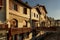 SAINT JEAN DE LUZ, FRANCE - SEPTEMBER 04, 2022: Traditional Basque houses in Jacques Thibaud walk in front of Big beach at sunset