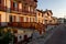 SAINT JEAN DE LUZ, FRANCE - SEPTEMBER 04, 2022: Traditional Basque houses in Jacques Thibaud walk in front of Big beach at sunset