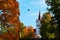 Saint John church in Cesis, Latvia captured surrounded by autumn foliage, fall colors