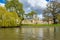 Saint John College on a bright sunny day with patches of clouds over the blue sky, Cambridge, United Kingdom