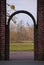 Saint Johns Church in Magdeburg seen through arch of the horse gate in Rotehornpark