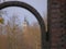 Saint Johns Church in Magdeburg seen through arch of the horse gate in Rotehornpark