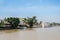 Saint-Louis, Senegal - October 14, 2013: Senegal River with waterfront and historical ship in town Staint-Louis