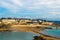 Saint Malo old town ramparts skyline and Plage de Bon-Secours on a sunny day, Brittany, France