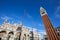 Saint Mark basilica facade low angle view and campanile in Italy