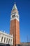 Saint Mark bell tower and National Marciana library facade in Venice, Italy