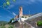 Saint Mary Church in Caldes de Montbui near Barcelona against blue sky in summer. Empty copy space