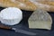 Saint-nectaire and camembert french cheese