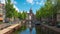 Saint Nicholas Church with Canal and Dutch buildings in Amsterdam city, Netherlands