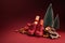 Saint Nicholas - Sinterklaas day with shoe, carrot and traditional sweets on red background