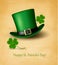 Saint Patrick\'s Day card with clove leaf and green hat.