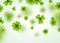 Saint Patricks Day Background Design with Green Falling Clovers Leaf. Irish Lucky Holiday Vector Illustration for