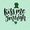 Saint Patricks Day greeting card with sparkled green clover leaves and text. Inscription - Kiss Me, I am Irish. St