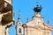 Saint Peter and Paul church clock and bell tower with automaton in a summer day in Mondovi, Italy