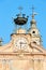 Saint Peter and Paul church clock and bell tower with automaton in a sunny summer day, blue sky