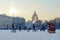 Saint Petersburg, Russia - 5, January 2016. People in historical costumes of the 18th century and walking tourists on the palace