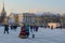 Saint Petersburg, Russia - 5, January 2016. People in historical costumes of the 18th century and walking tourists on the palace