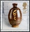 Saint Petersburg, Russia - April 01, 2020: Postage stamp issued in the United Kingdom with the image of the Pot by Bernard Leach,