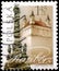 Saint Petersburg, Russia - April 30, 2020: Postage stamp printed in the Poland with the image of the Tower and Column, Raciborz,