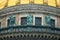 Saint Petersburg, Russia - Feb 26, 2016: Golden Dome with three angel figures of Saint Isaac`s Cathedral. Detail.