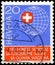 Saint Petersburg, Russia - May 05, 2020: Postage stamp issued in the Switzerland with the image of the Globe with Swiss cross,